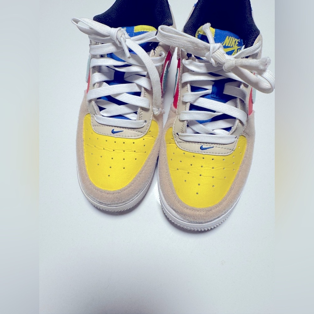 Nike Yellow and Blue Sneakers with Classic Silhouette